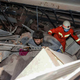 Rescuers help pull a man from the rubble after a hotel in Quanzhou, China inexplicably collapsed Saturday.